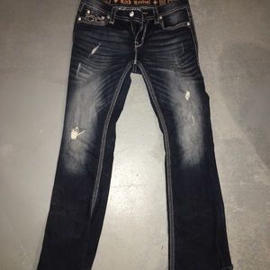 Light distressed boot cut rocks